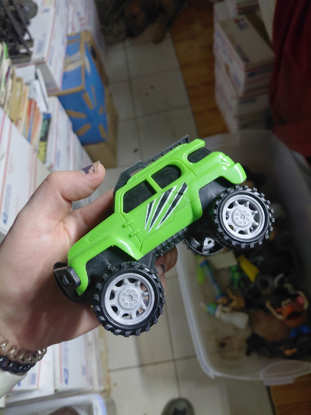 bright green plastic off-road SUV toy car